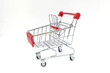 © Karlie Studio - Shopping cart isolated, A grocery shopping cart on a white background. Shopping concept.