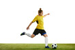 © master1305 - Young woman, professional female football player in motion, training, playing football, soccer isolated over white background