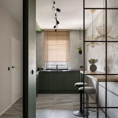 Modern kitchen with reinforced glass wall