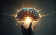 © Arcreative - 3d glowing brain over hand