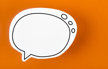 The Speech bubble with copy space communication talking speaking concepts on orange colour background.