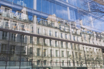 Wall Mural - Building reflecting in a glass Facade, Paris, France