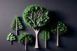 © surassawadee - top view of paper made green trees isolated on grey, recycling and environment protection concept