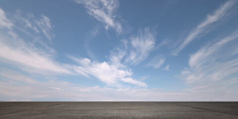 Wall Mural - Heavenly Blue Sky Background with Beautiful Nice Weather Clouds and Empty Gray Asphalt Floor