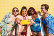 Group of beautiful plus size women with swimwear bonding and having fun at the beach - Group of curvy female friends enjoying summertime at the sea, concepts about body acceptance, body positive