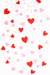 Flat lay Valentine's Day background made of red and pink hearts on white background. Valentine's Day creative concept. Top view, pattern.