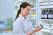 © zinkevych - Female pharmacist working in the drugstore
