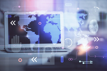 Poster - Double exposure of desktop with computer and world map hologram. International data network concept.