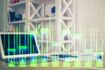 Poster - Financial chart drawing and table with computer on background. Multi exposure. Concept of international markets.