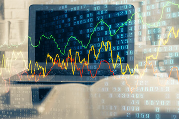 Poster - Financial chart drawing and table with computer on background. Multi exposure. Concept of international markets.