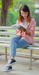 Sticker - asian woman reading on bench