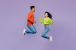 © ViDi Studio - Full body sideways overjoyed young couple two friends family man woman of African American ethnicity wears casual clothes together do winner gesture isolated on pastel plain light purple background.