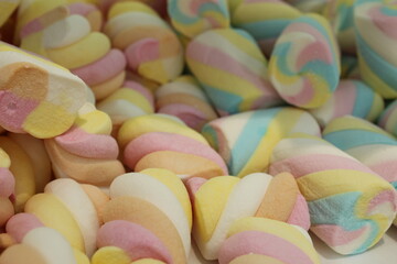 Canvas Print - background food colored marshmallow marshmallows close-up. A day without sweetness without diet