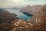 Fototapeta Góry - Winding mountain road in Musandam Oman taken in May 2022