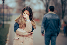Sad Upset Woman Crying After A Painful Break-up. Man Leaving His Girlfriend After Bad Split-up Last Date
