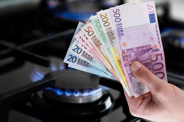 Sticker - Money banknotes and gas stove, energy crisis concept.