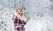 © be free - New Year. woman warm clothes in snowy forest. trees covered white snow. female casual style for cold season. girl make and play snowball. winter activity. happy woman enjoy winter landscape