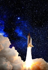 Wall Mural - shuttle launch in the clouds to outer space. dark space with stars on background.spaceship flight. e