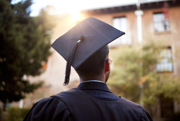 Black man, graduation and ideas at university building, school and college with employment opportunity goal. Thinking student, graduate and hope in graduation cap, ceremony and education event