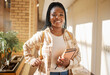 © K.A./peopleimages.com - Face portrait, student and black woman in university ready for learning, goals or targets. Education, scholarship and happy female learner from South Africa with books for studying and knowledge.