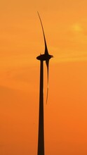 Renewable Energy Production, Windmill, Turbine Propeller Rotating On Sunset, Vertical Short Video
