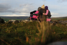 A Mum And 2 Daughters Take A Rest On A Walk In Yorskhire