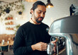 © K.A./peopleimages.com - Small business, cafe barista and man working on morning espresso machine in a restaurant. Waiter, milk foam and breakfast latte of a worker from Brazil busy with drink order service as store manager