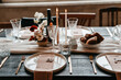 © Melissa Milis Photography/Stocksy - Close up of a rustic table setting