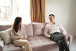 © Ivan Ozerov/Stocksy - Couple talking during psychotherapy session
