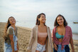 © Jovo Jovanovic/Stocksy - Cheerful female friends having leisure time at beach during summer