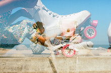Double Exposure Of Girl Tying Roller-skate Laces