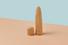 Gilded Corn Cobs On Duotone Background.