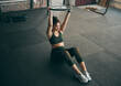 © K.A./peopleimages.com - Exercise, weight plate and woman at gym for workout, fitness and training for health and body wellness. Strong sports female or bodybuilder on floor doing weightlifting for power, energy and balance