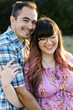 © Serena Burroughs/Stocksy - Portrait of Smiling Expectant Couple