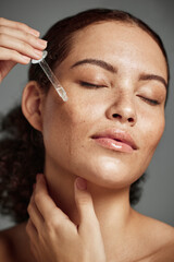 Wall Mural - beauty, skincare and serum with face of woman for facial, product or self care with morning routine.