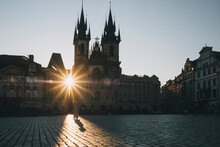 Woman Walking At Old Town Square During Sunrise, In Prague, Czechia.