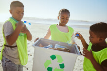 Group Of Children Cleaning Beach Or Recycling Plastic For Education, Learning Or Community Help In Climate Change Project, Ngo And Charity. African Friends With Recycle Box And Teamwork On Earth Day