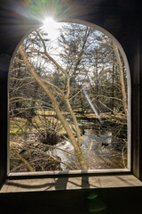 Poster - window of covered bridge looking out