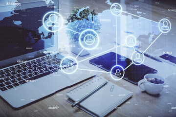 Aufkleber - Computer on desktop with social network hologram. Double exposure. Concept of international people connections.
