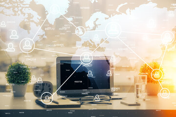 Poster - Computer on desktop with social network hologram. Double exposure. Concept of international people connections.