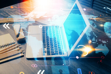 Poster - Double exposure of desktop with computer and world map hologram. International data network concept.
