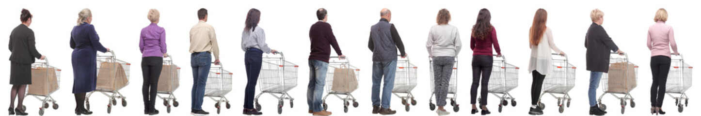 a group of people with a cart stand with their backs isolated