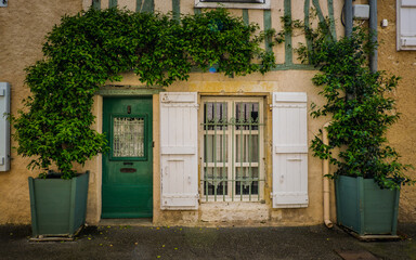 Wall Mural - Cute, flowery and narrow streets of the small village of Lectoure in the south of France (Gers)