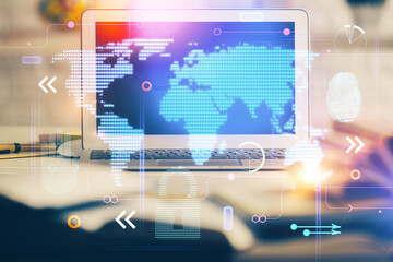 Poster - Double exposure of desktop with computer and world map hologram. International data network concept.