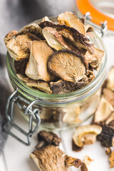 Poster - Sliced dried mushrooms in jar.