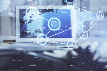 Aufkleber - Computer on desktop with social network hologram. Multi exposure. Concept of international people connections.