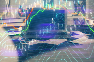Poster - Financial graph colorful drawing and table with computer on background. Double exposure. Concept of international markets.