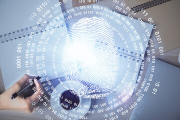 Aufkleber - Blue fingerprint hologram over woman's hands taking notes background. Concept of protection. Double exposure
