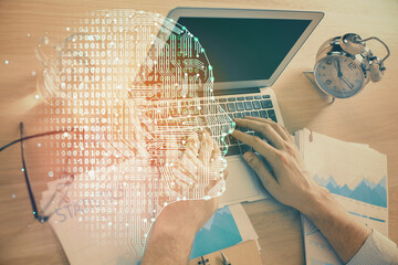 Poster - Man typing on keyboard background with brain hologram. Concept of big Data.