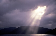 God's Rays Shining Through Clouds In British Columbia